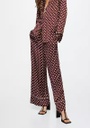 Pantalón satinado lunares Mango